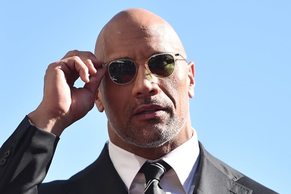 Actor Dwayne Johnson attends a ceremony honouring him with the 2,624th star on the Hollywood Walk of Fame on December 13 in Hollywood, California. Photo: Agence France-Presse