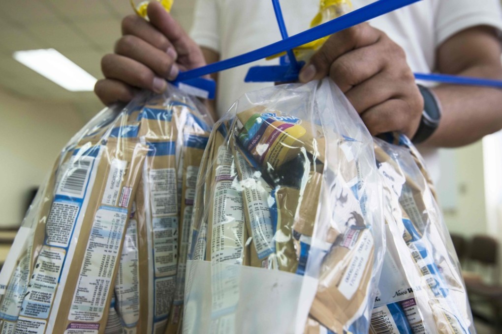 Samples of baby milk formula imported from the French group Lactalis. Photo: AFP