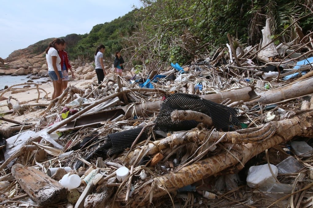 Rubbish lies strewn across a beach at Soko Island in November. Photo: K. Y. Cheng