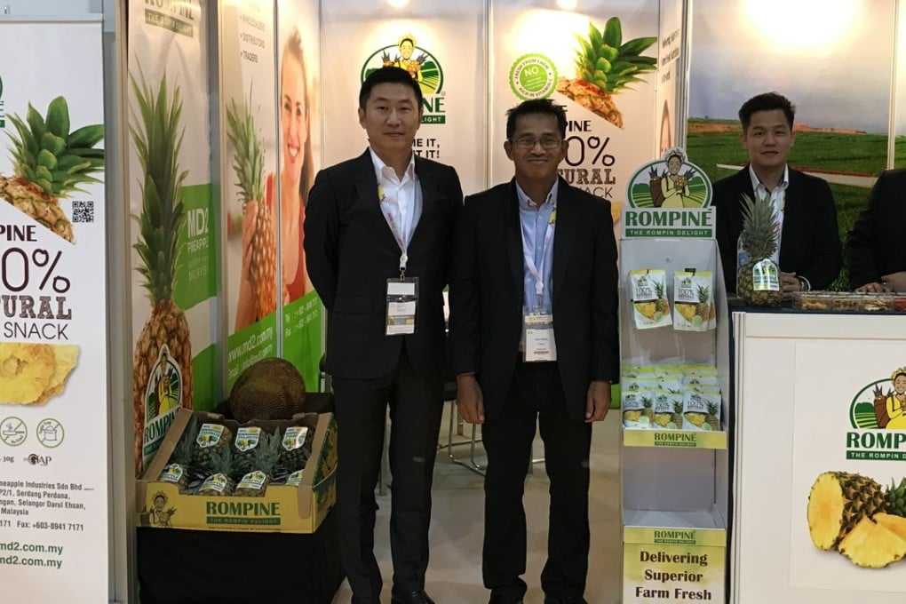 Patrick Teoh (left), general manager, and the sales team