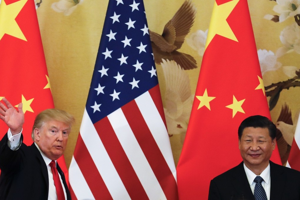 US President Donald Trump (left) waves next to Chinese President Xi Jinping during his state visit to Beijing in November. China’s deputy foreign minister said the clarity of the two nations’ economic policies can help drive global growth. Photo: AP