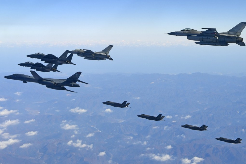 South Korea F-16 and F-15K combat planes, US Air Force B-1B bomber planes and F-35A and F-35B combat planes flying in the sky over South Korea while on a bombing drill mission to hit at a simulated target at the Pilseung Range in Gangwon-do, South Korea. Photo: EPA