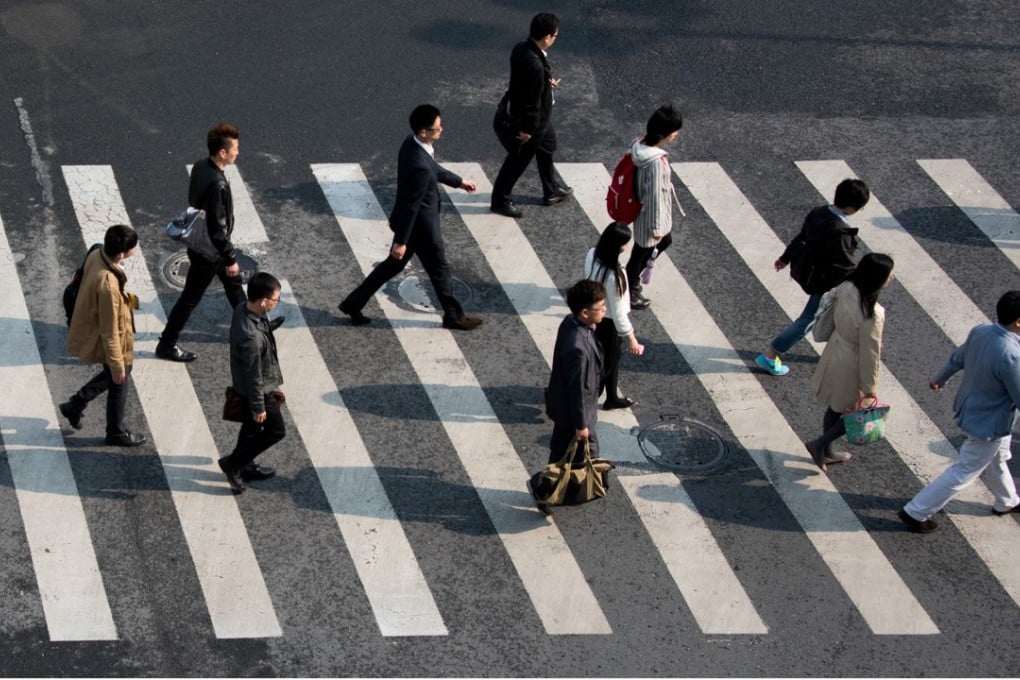Walk this way: traffic authorities are campaigning to promote “zebra crossing courtesy” across China. Photo: AFP
