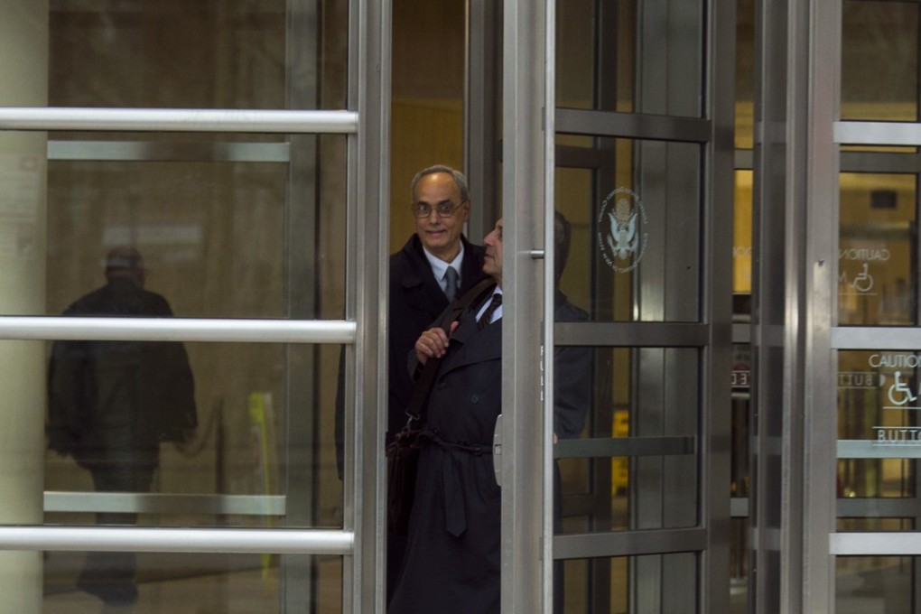 Former Peru federation boss Manuel Burga leaves the Brooklyn courthouse on Friday. Photo: AP