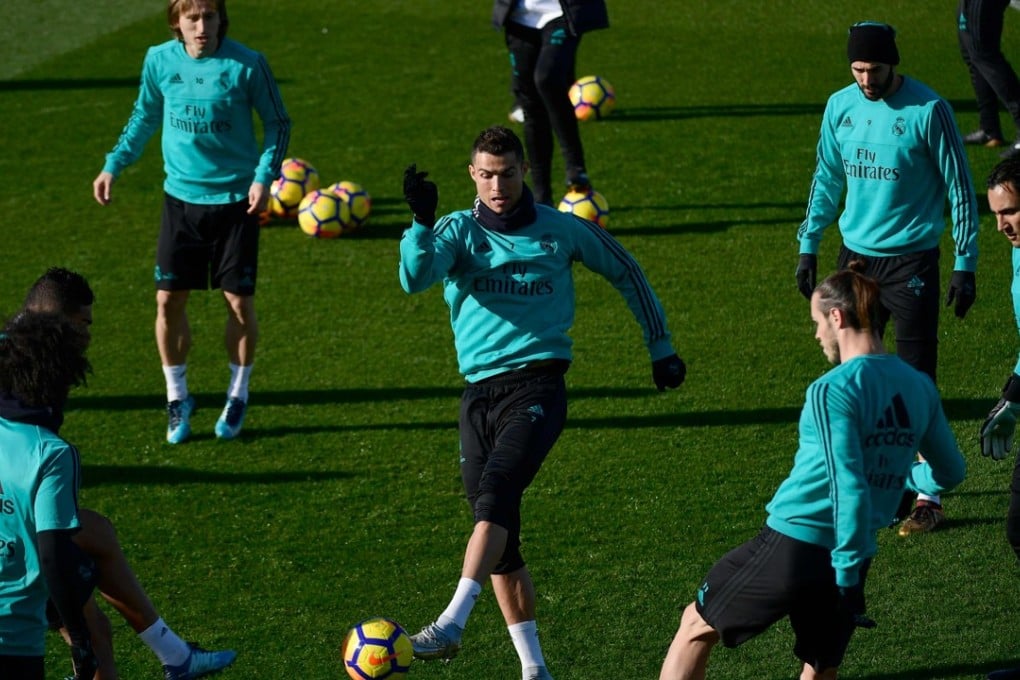 Cristiano Ronaldo (centre) trains with Gareth Bale (second right) during Real Madrid training. Photo: AFP