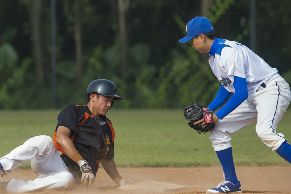 A match between the Guangdong Leopards against the Beijing Tiger during the The China Baseball League at the Olympic Sports Centre of Guangzhou in Guangzhou, China. MLB will be building 10 baseball academies to boost the popularity of the sport in China. Photo: May Tse