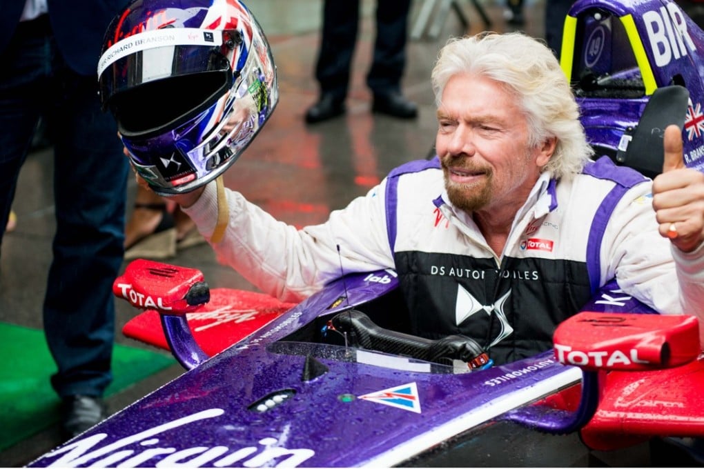 Richard Branson poses in the DS Virgin Racing car at the New York E-Prix. Photos: Handout