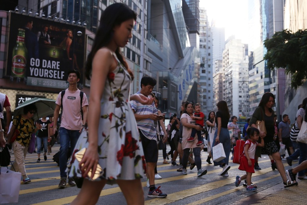 Many residents, especially the young, are under immense pressure due to stagnating salaries and long working hours, Paul Chan said. Photo: Sam Tsang