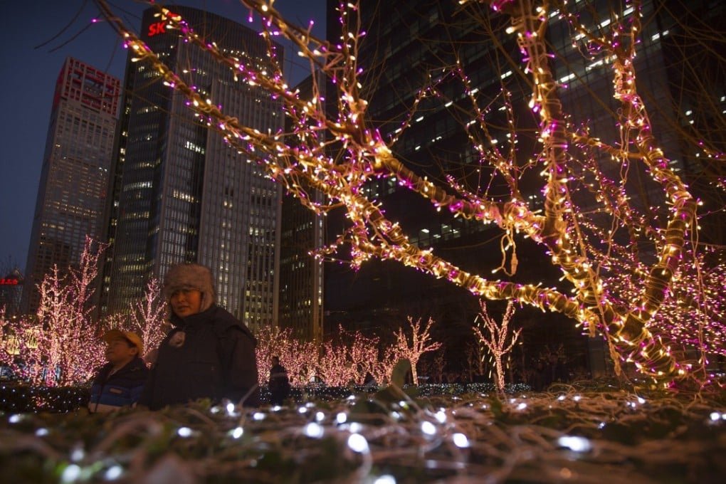 Christmas lights on display in central Beijing. Many retailers see the festival as a chance to boost sales. Photo: AP