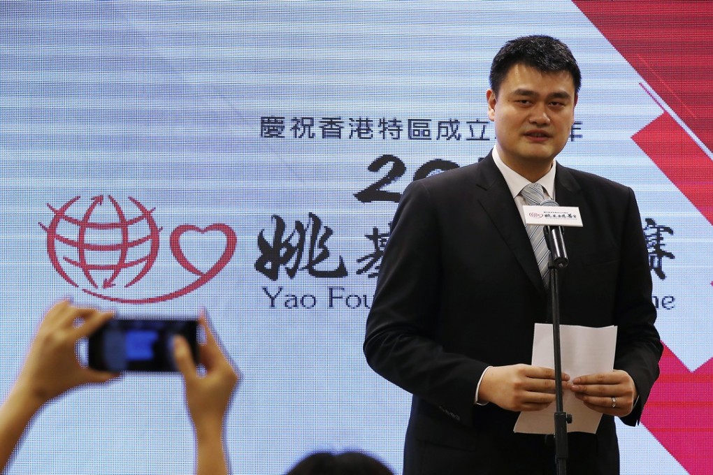 Yao Ming in Hong Kong in May for the 20th anniversary of the handover. Photo: Nora Tam
