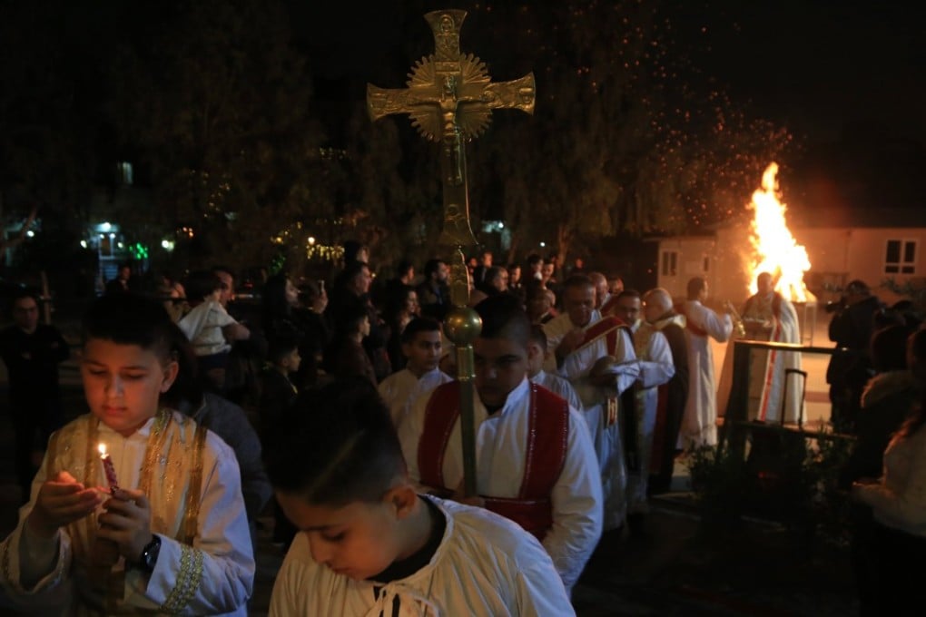 Iraqi Christians attend a Mass on Christmas eve. Photo: EPA