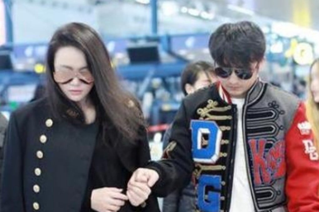 Chinese boxer Zou Shiming and wife Ran Yingying arrive in Shanghai to seek medical help for a suspected detached retina. Photo: Sina.com.cn