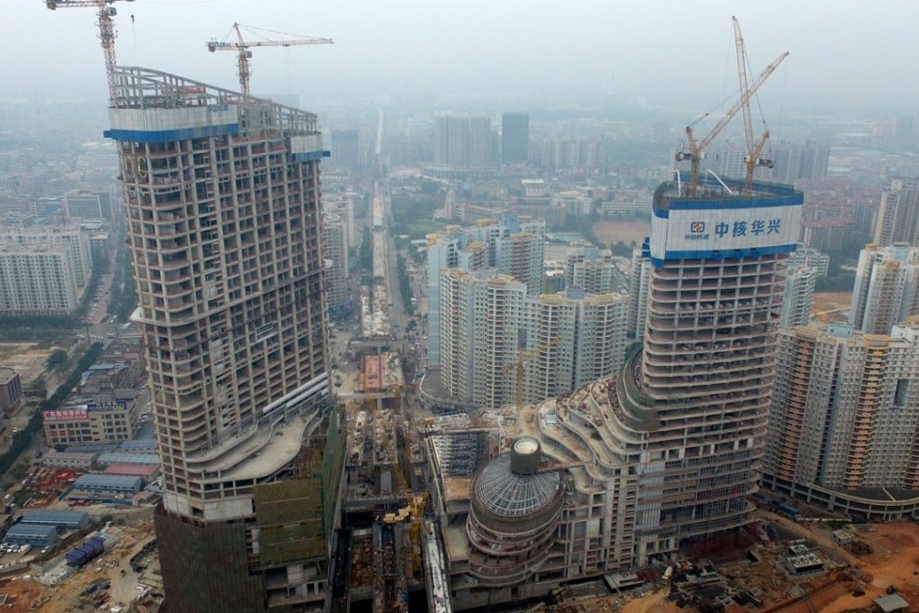 A haze of pollution over construction work in Guangzhou in southern Guangdong province. Photo: Xinhua