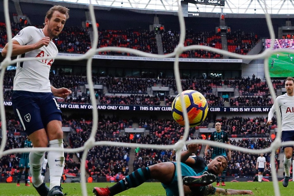 Tottenham striker Harry Kane (left) scores his second goal against Southampton. Photo: AFP