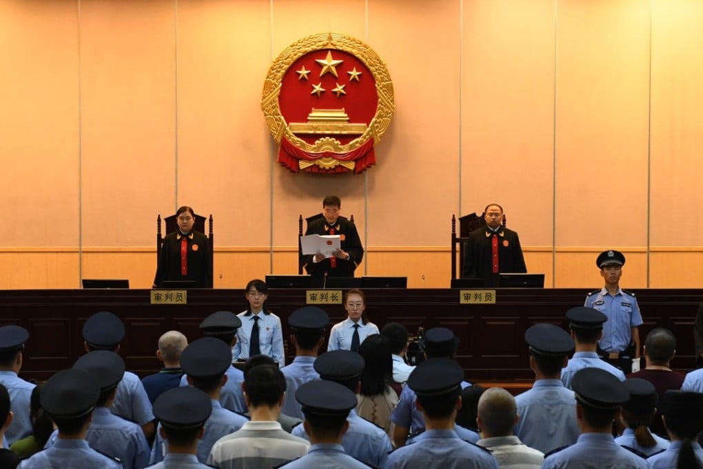 A case involving 26 executives of a Chinese online peer-to-peer (P2P) lender is heard before Beijing No. 1 Intermediate People's Court in September 2017. Photo: Xinhua