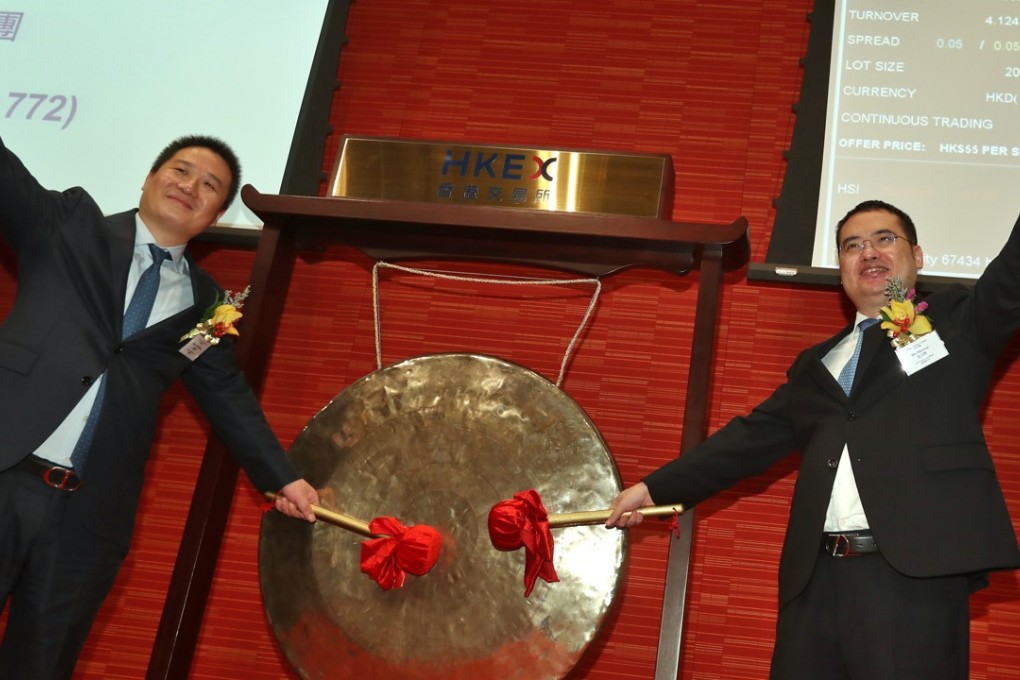 China Literature co-CEOs Liang Xiaodong and Wu Wenhui at the listing ceremony for their Hong Kong IPO, one of the biggest of the year. Photo: Nora Tam