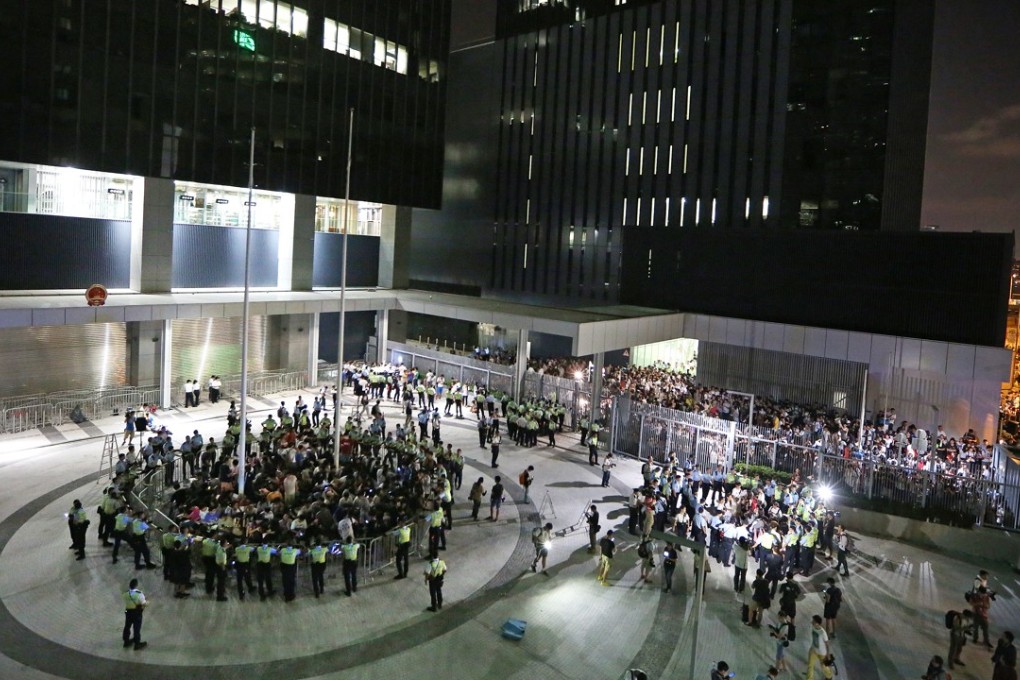 Protesters are surrounded by police after they stormed into ‘Civic Square’ in 2014. Photo: Sam Tsang
