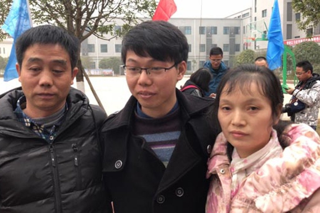 The Zhang family were reunited 20 years after the son was kidnapped. Photo: Xinhua
