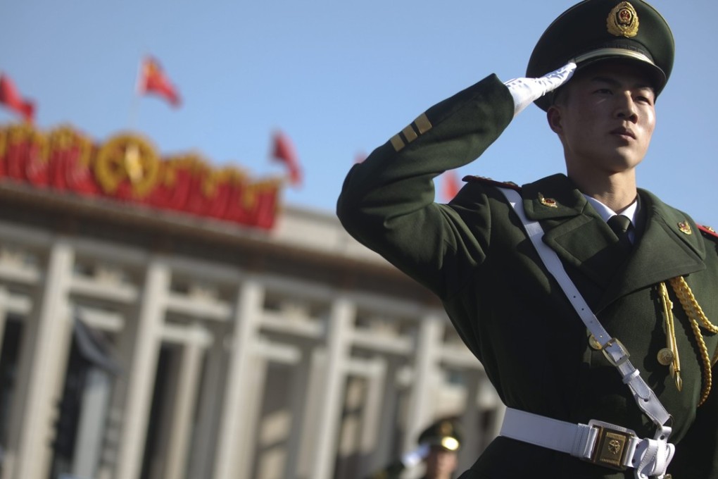 China’s 1.5 million-strong paramilitary police force will now report to the Central Military Commission, headed by Xi Jinping. Photo: EPA