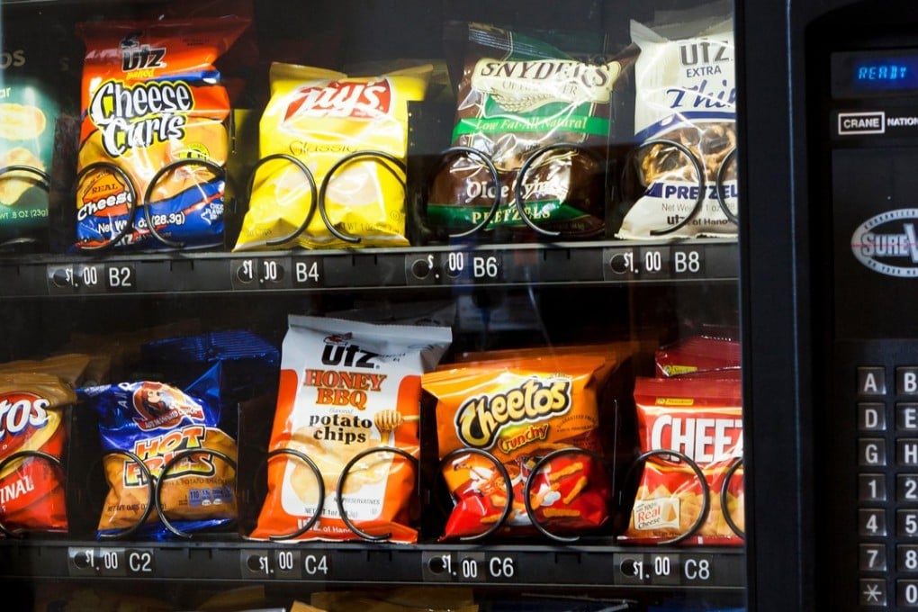 Many schools now have vending machines that sell confectionery, crisps and fizzy drinks. Photo: Alamy