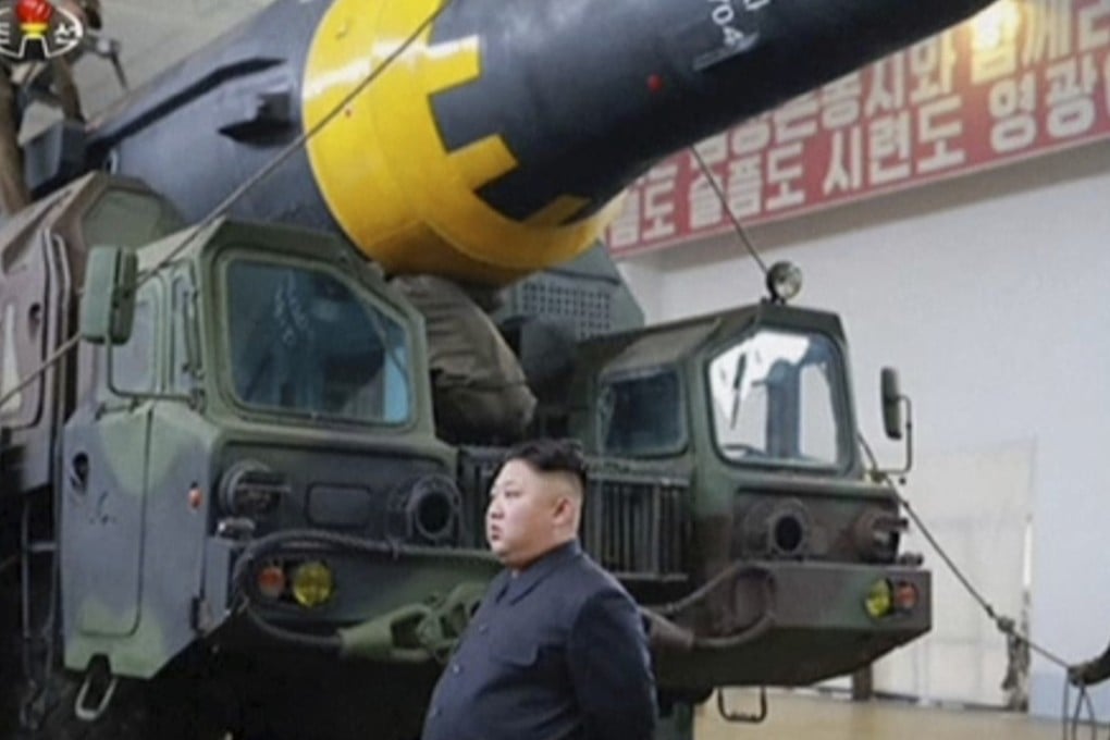 US citizens are split on whether there should be military action in North Korea, with a third in favour and around 44 per cent against it, a new poll shows. Pictured: Kim Jong-un at what is claimed by the country to be a missile test site. Photo: AP