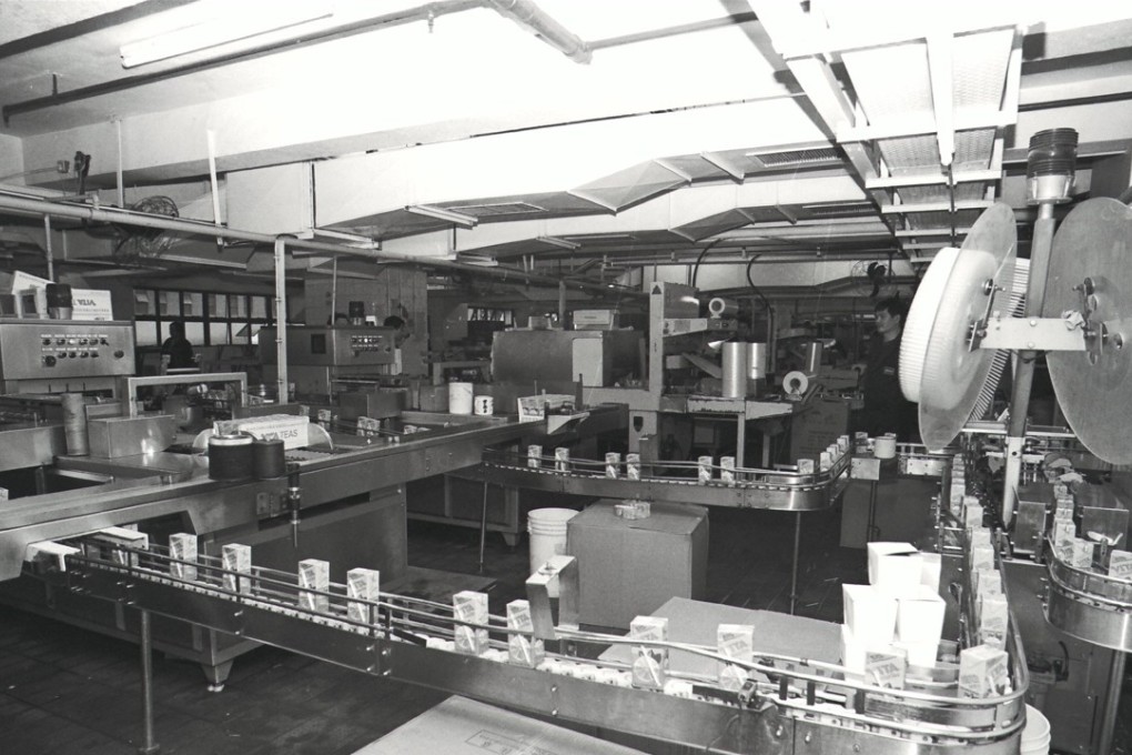 Cartons of Vitasoy drinks being manufactured in the company factory.