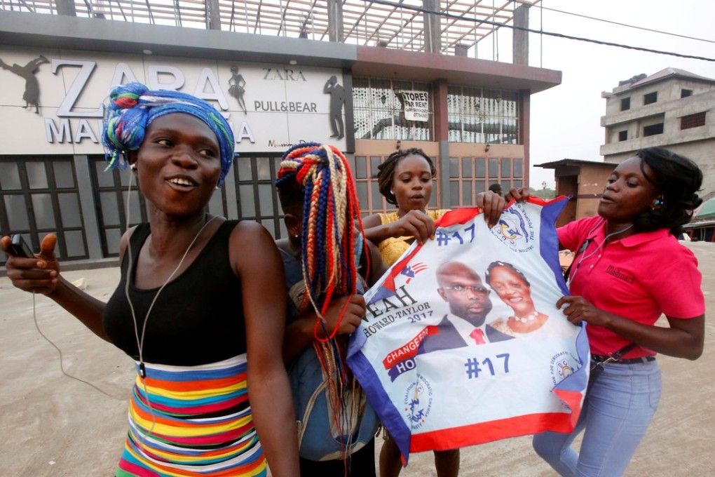 Supporters of George Weah celebrate after the announcement of the presidential election results in Monrovia, Liberia. Photo: Reuters