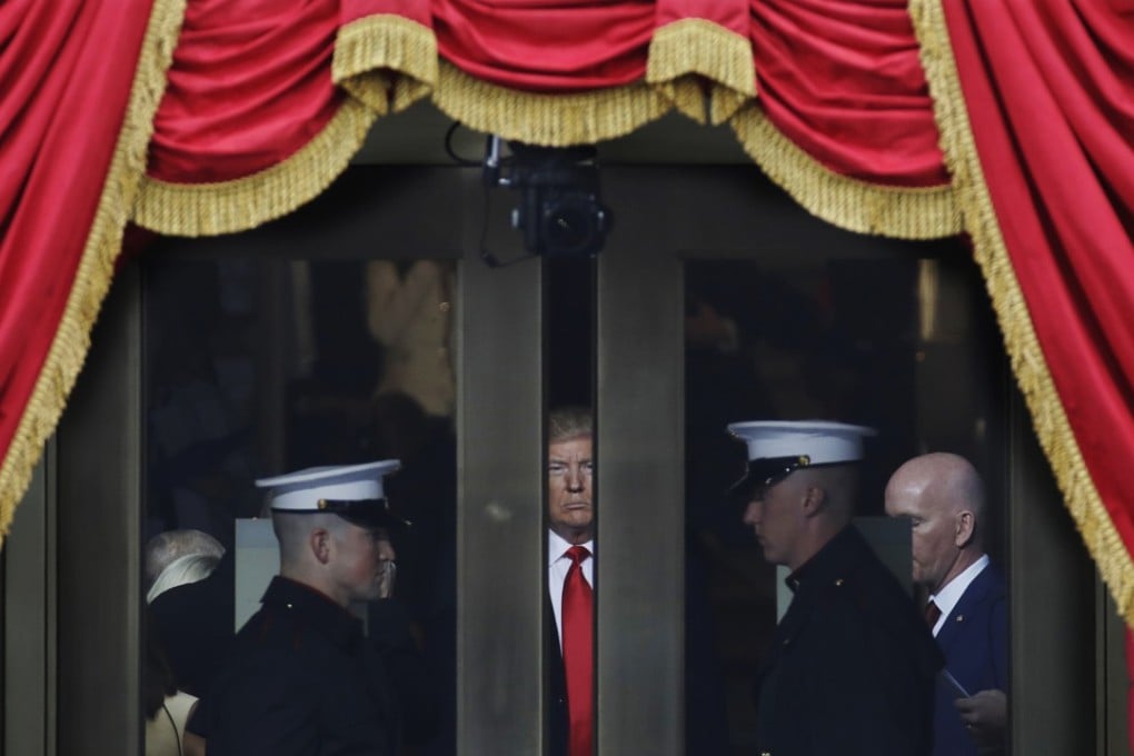 In this January 20, 2017 file photo, then president-elect Donald Trump waits to step out onto the portico for his Presidential Inauguration at the US Capitol in Washington. Photo: AP