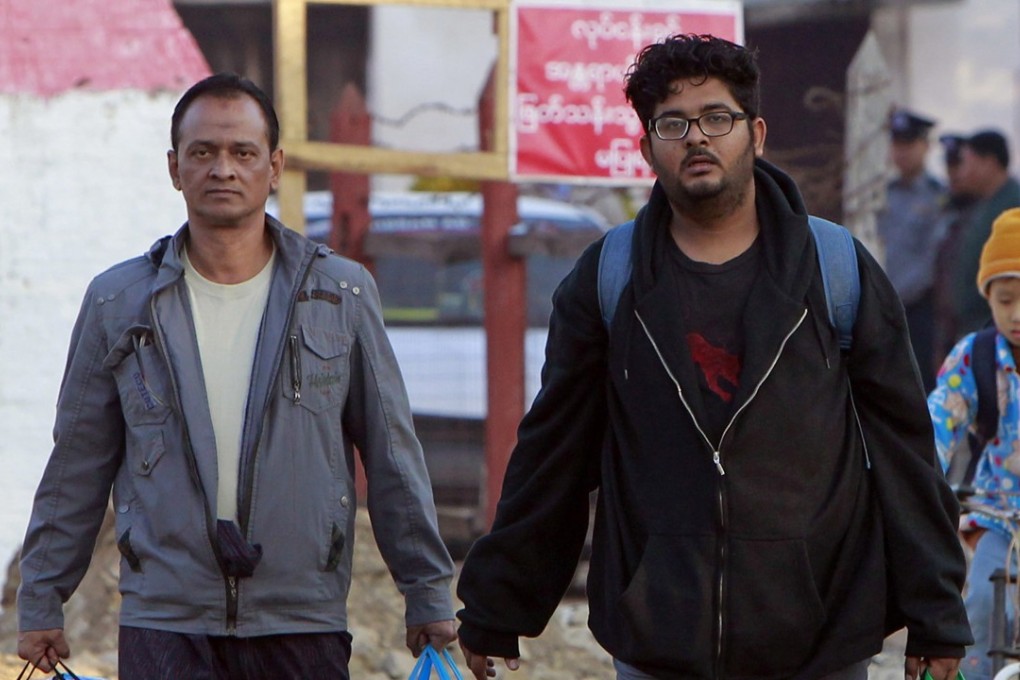 Local interpreter Aung Naing Soe, right, and driver Hla Tin after they were released. Photo: AP