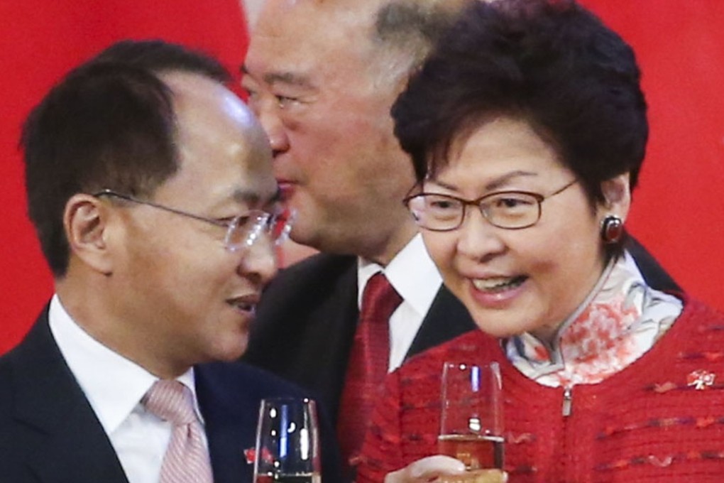 Wang Zhimin, director of the central government's liaison office in Hong Kong, share a toast with Hong Kong Chief Executive Carrie Lam at the National Day reception in Wan Chai, on October 1. Photo: K. Y. Cheng