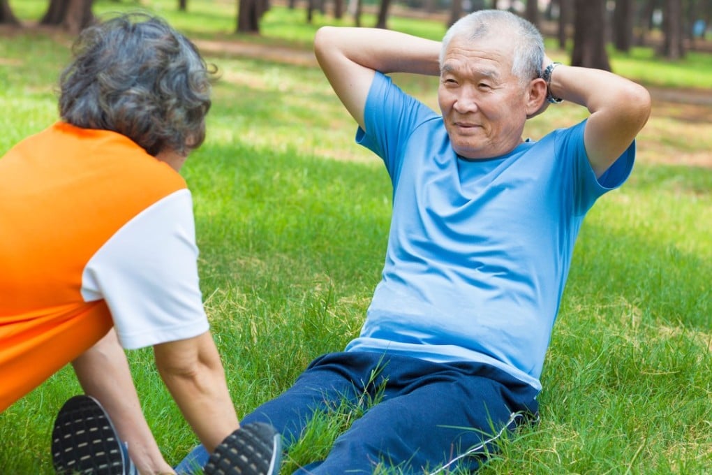 An elderly man does sit-ups in a park. Hong Kong’s life expectancy has increased faster than the global average but room for improvement remains, especially in quality of life. Photo: Alamy