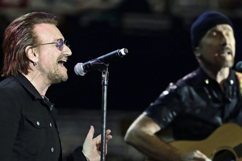 Bono (left) and The Edge (right) of Irish rock band U2 perform in Milan, Italy, on December 7. Photo: EPA