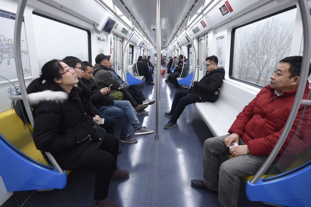 Passengers travel on the Yanfang subway line in Beijing. The fully automated service was one of three new lines to open for business in the Chinese capital on Saturday. Photo: Xinhua
