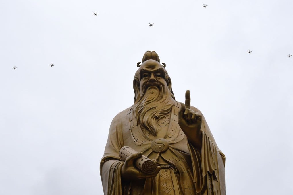 Drones fly above the statue of Lord Laozi during the Laojun Mountain Drone Convention in Luoyang in China's central Henan province in August. Photo: AFP