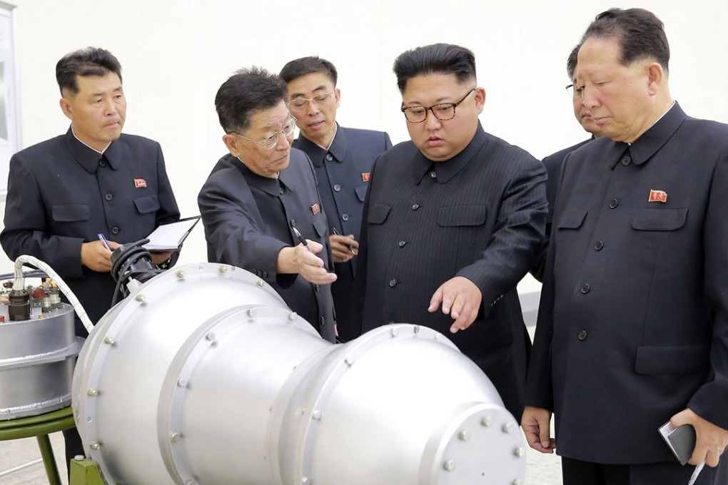 North Korean leader Kim Jong-Un (second right) in an undated photograph released by North Korea's official Korean Central News Agency on September 3, the day his country’s staged its latest and biggest nuclear weapons test. Photo: AFP/KCNA via KNS