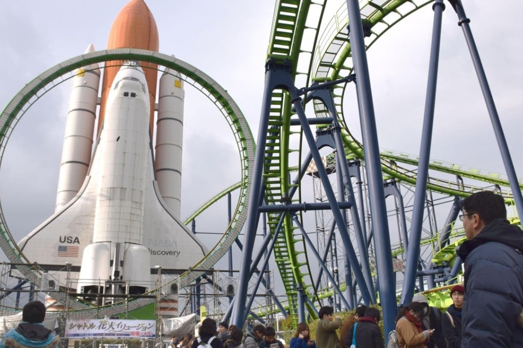 Fans flock to the Space World amusement park for the last time. Photo: Kyodo