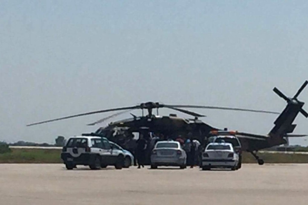 Greek policemen check a Turkish Blackhawk helicopter after landing at the airport of Alexandroupolis, northeastern Greece, on July 16, 2016. File photo: AP
