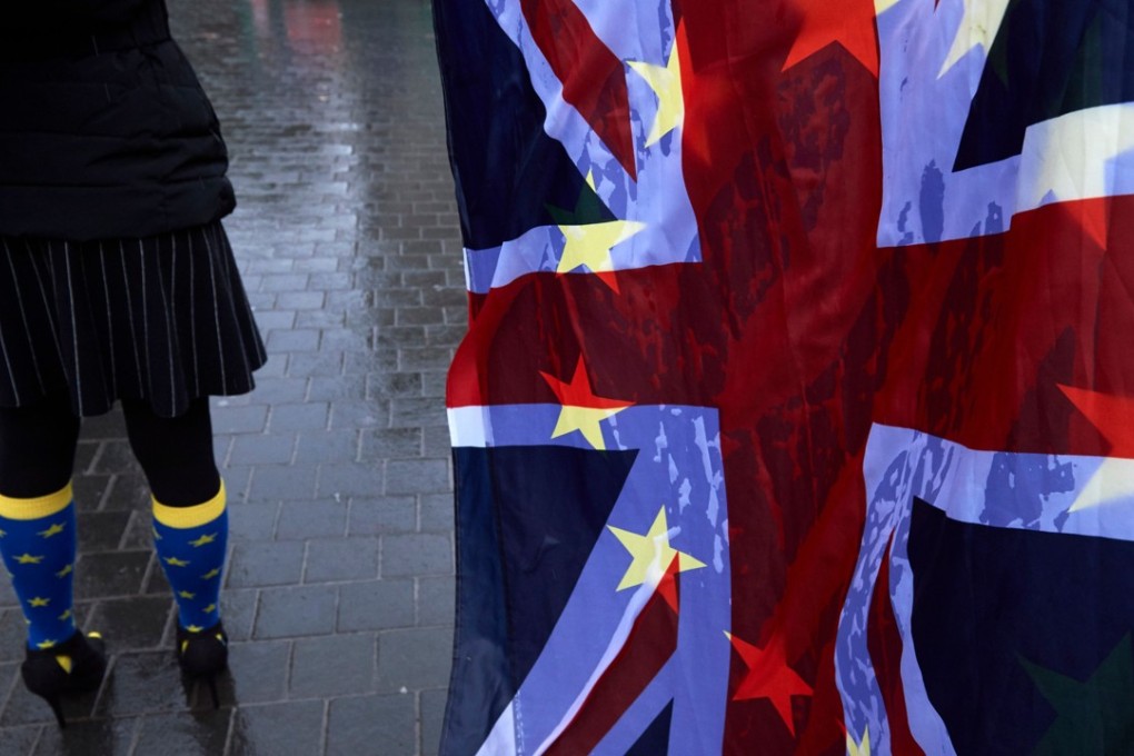 A pro-EU anti-Brexit demonstrator rallies outside the Houses of Parliament in central London on December 13. British Prime Minister Theresa May’s imperial vision of a Britain trading on its own terms with everyone is 150 years out of date. Photo: AFP