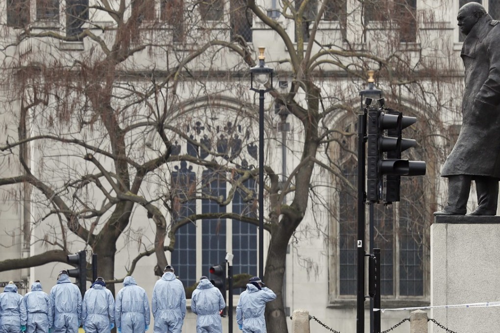 In this March 23, 2017, file photo, police forensic officers work in Parliament Square outside the Houses of Parliament in London where a knife-wielding man went on a deadly rampage, first driving a car into pedestrians then stabbing a police officer to death before being fatally shot by police. Photo: AP