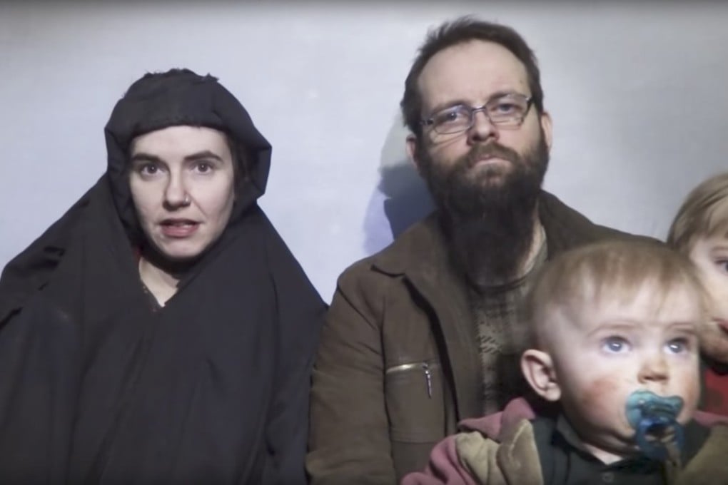 Caitlan Coleman, husband Joshua Boyle, and their two children appear in a hostage video released in December 2016. Photo: AP