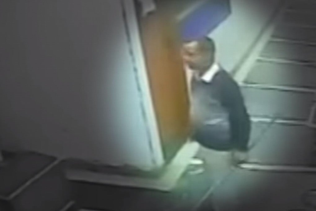 Security camera footage released by police shows Naresh Dhankar, a former Indian army lieutenant weilding an iron rod that police say he used to murder six people in the small town of Palwal. Photo: CCTV via The Quint