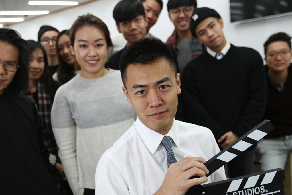 Outgoing Commission on Youth chairman Lau Ming-wai (centre) with staff at their office in Wan Chai. Photo: Nora Tam