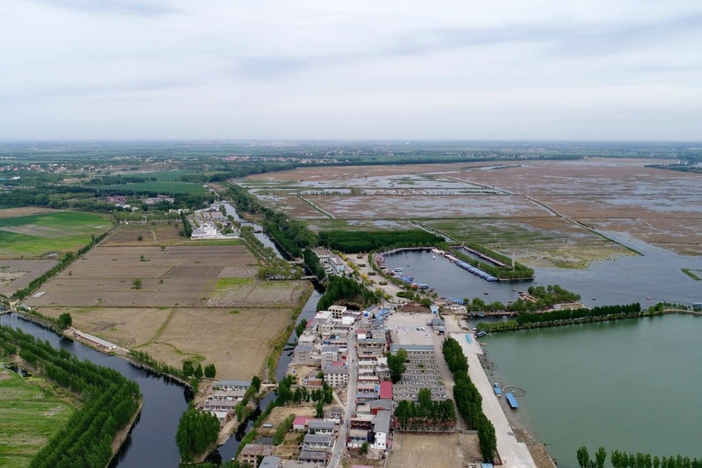 Aerial view of a village in Baiyangdian, one of the largest freshwater wetlands in the northern Chinese province of Hebei. The Xiongan New Area, officially announced on April 1, 2017, will span Xiongxian, Rongcheng and Anxin counties and will eventually cover 2,000 square kilometres. Photo: Xinhua