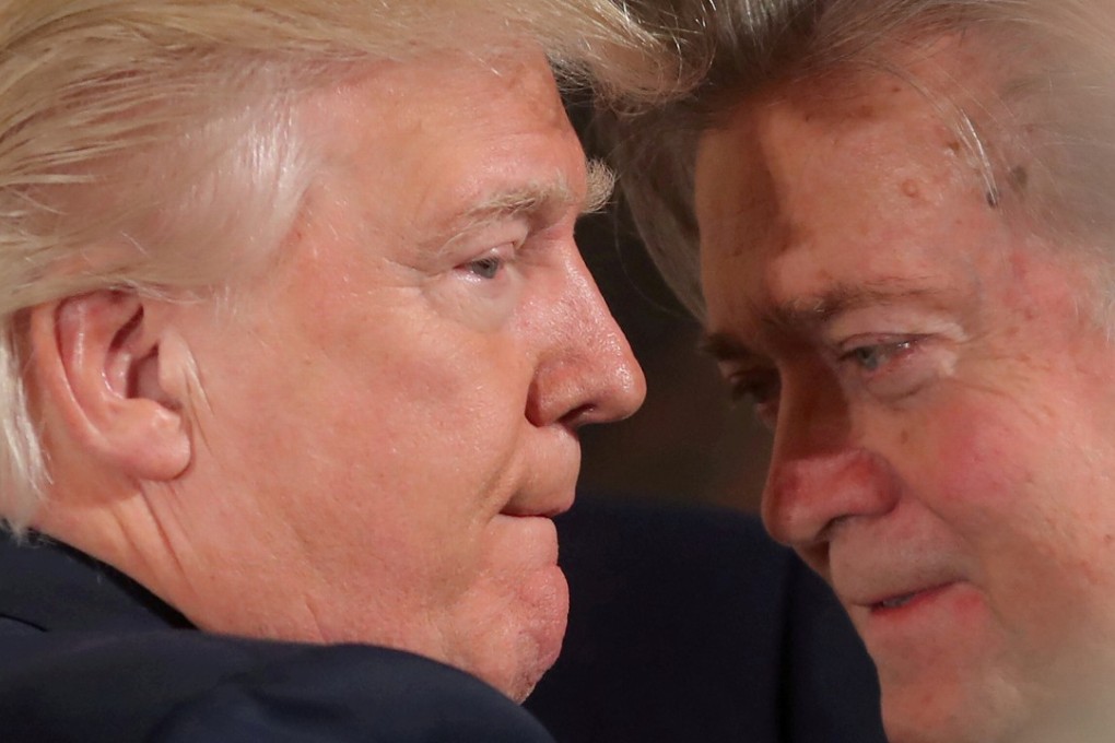 Donald Trump has lashed out at Steve Bannon after the ex-adviser accused his son and team of treason, and his son-in-law of laundering money. They are seen here at a swearing-in ceremony for senior White House staff on January 22. Bannon was fired as chief strategist in August. Photo: REUTERS