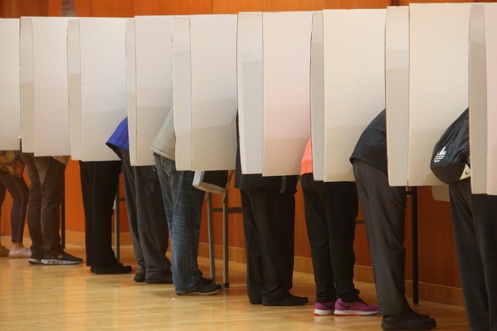 Voters cast their ballots at a polling station in Quarry Bay in 2016 elections. Photo: Sam Tsang