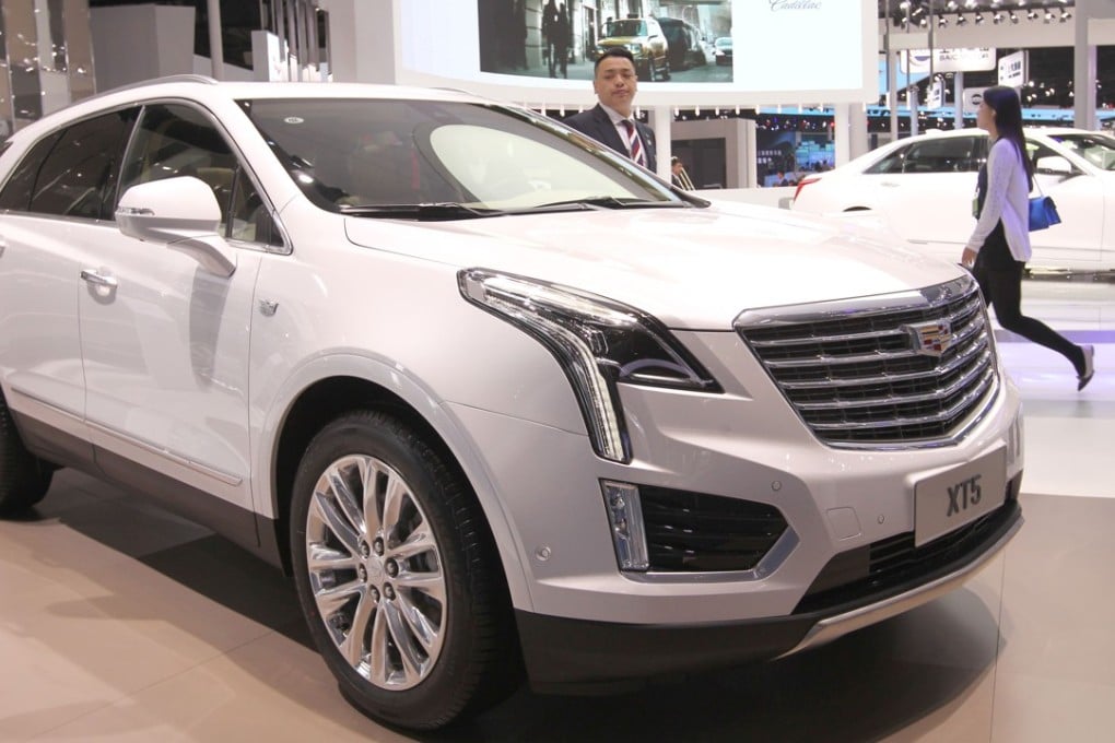 A Cadillac XT5 SUV is displayed at the Shanghai car show in April last year. The car brand helped GM sell a record 4 million units in China in 2017. Photo: Simon Song