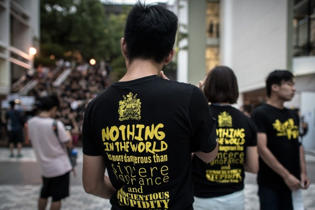 More than 1,000 students, alumni and teachers joined a protest on October 9, 2015 at the University of Hong Kong as anger mounts over fears of Beijing’s political interference in the city's education system. Photo: AFP