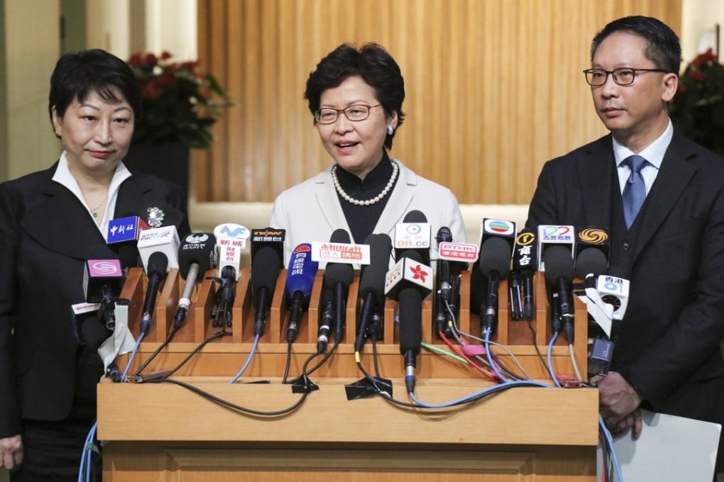 Chief Executive Carrie Lam (centre) with Teresa Cheng and Rimsky Yuen. Photo: Felix Wong