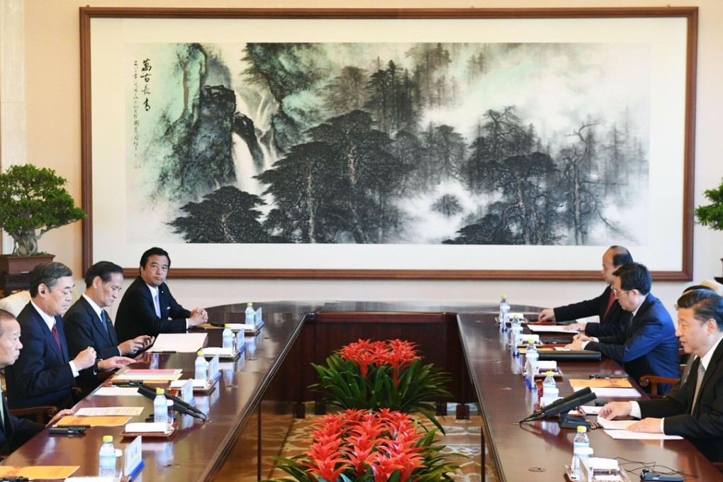 President Xi Jinping, far right, and Toshihiro Nikai, far left, secretary general of Japan's Liberal Democratic Party, hold talks at the Diaoyutai State Guesthouse in Beijing after the Belt and Road Forum for International Cooperation was concluded. Photo: Kyodo