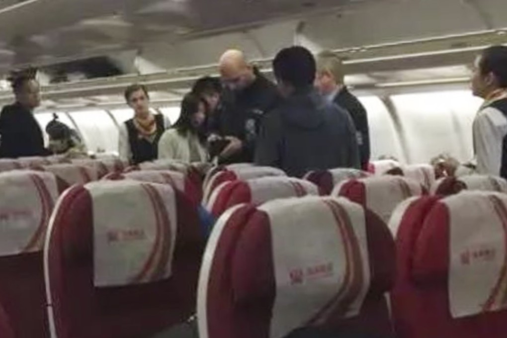 A dozen passengers said they had cash stolen during a Hainan Airlines flight from Beijing to Prague on December 29. Photo: Handout